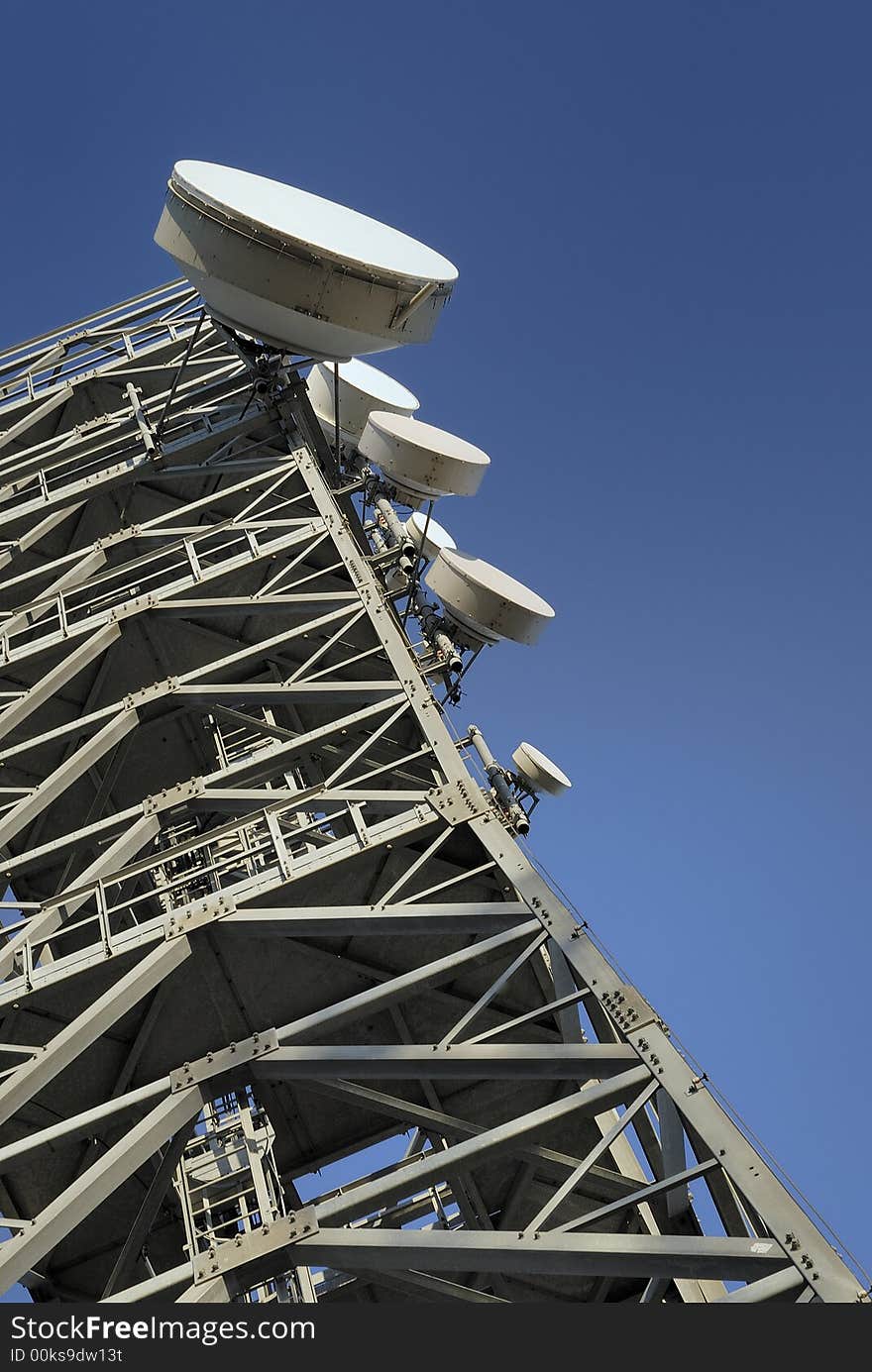 Communications iron tower from below. Communications iron tower from below