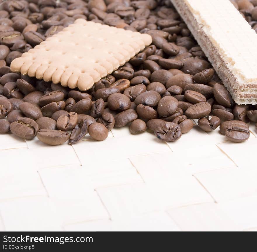 Coffee beans and biscuit