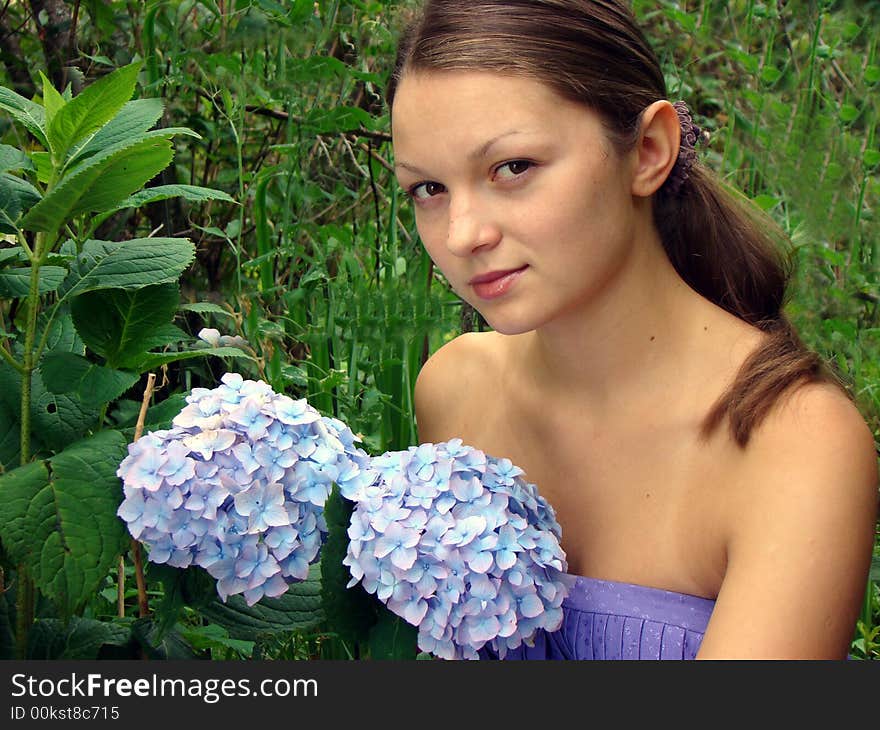 The young girl еnd flower