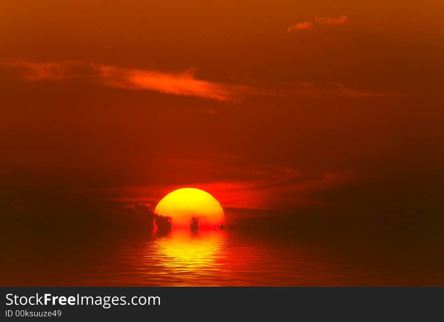 Orange sunset over sea and sky with clouds. Orange sunset over sea and sky with clouds