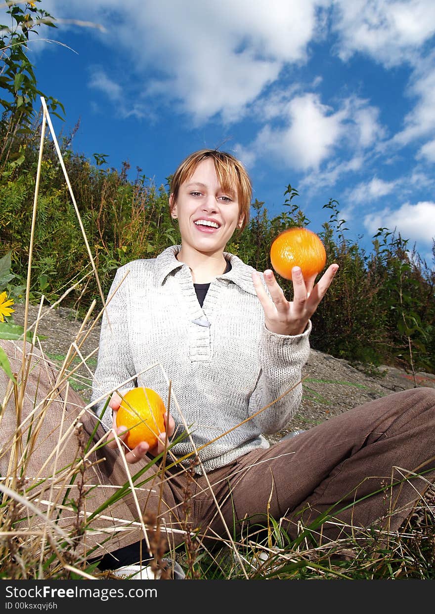 Girl in nature with orange jungling. Girl in nature with orange jungling