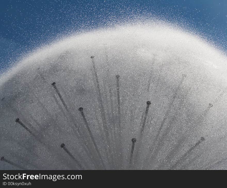 Fountain-aquatic ball, sparks,sunlight. Fountain-aquatic ball, sparks,sunlight