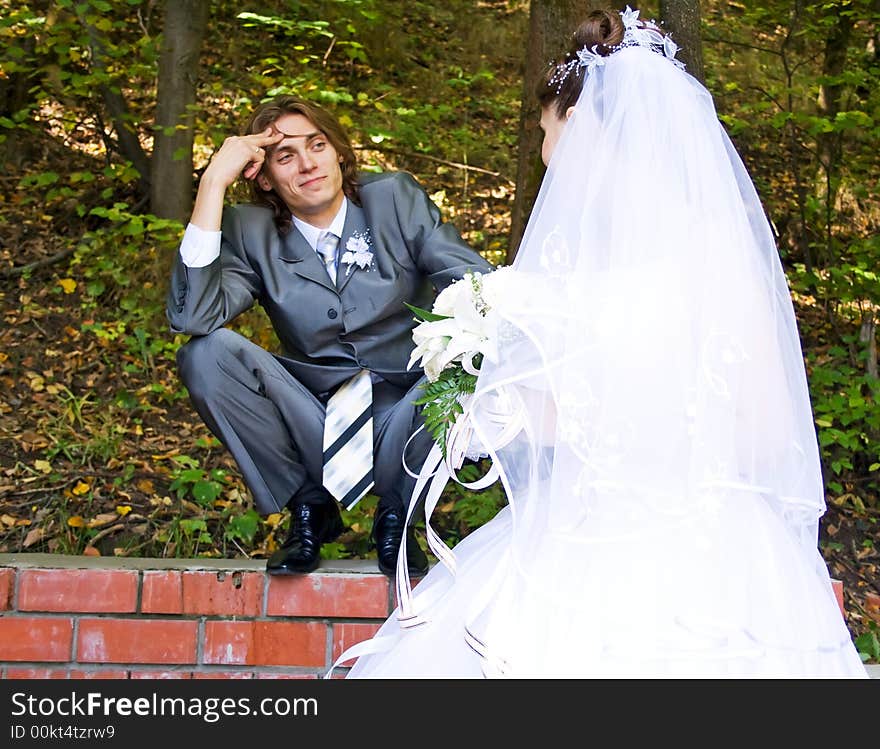 Bridegroom on the wall in the forest