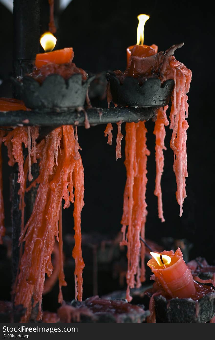 There is a candleholder in the front of PuNing Temple. Some remainder candle shaped a beautiful figure. There is a candleholder in the front of PuNing Temple. Some remainder candle shaped a beautiful figure.