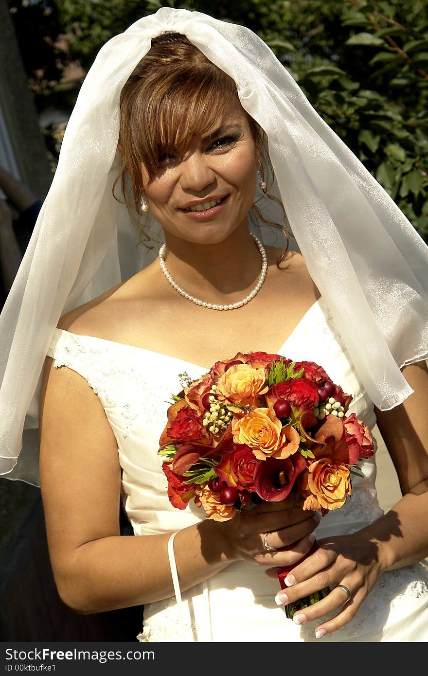 Bride smiling and posing before her wedding