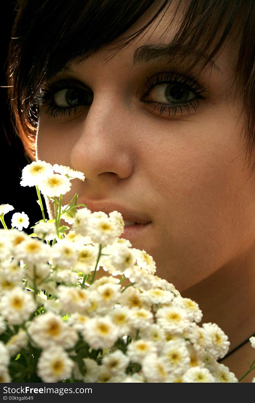 Beautiful girl with flowers