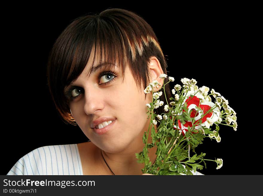 Young beauty with flowers