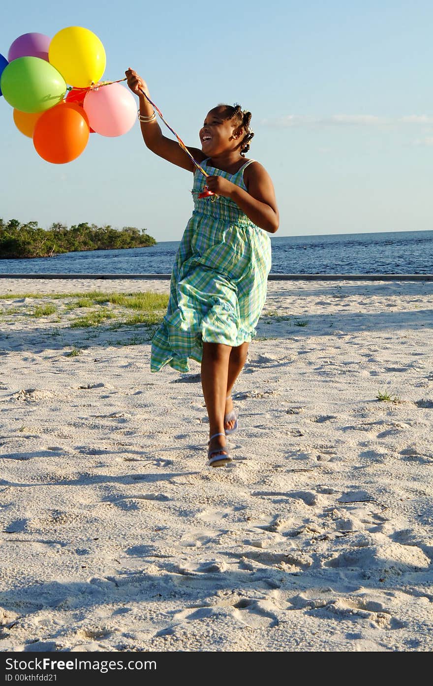 Happy Girl With Balloons