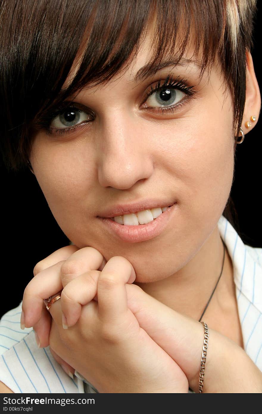 The young girl with expressive emotions, isolated on black background