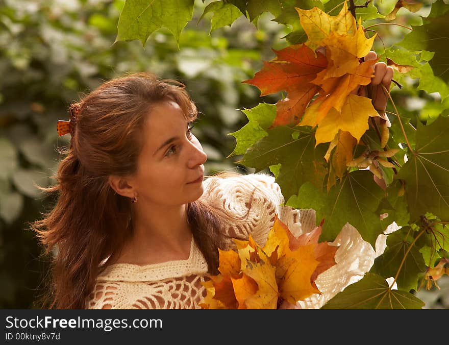 Nice woman with yellow leaf. Nice woman with yellow leaf