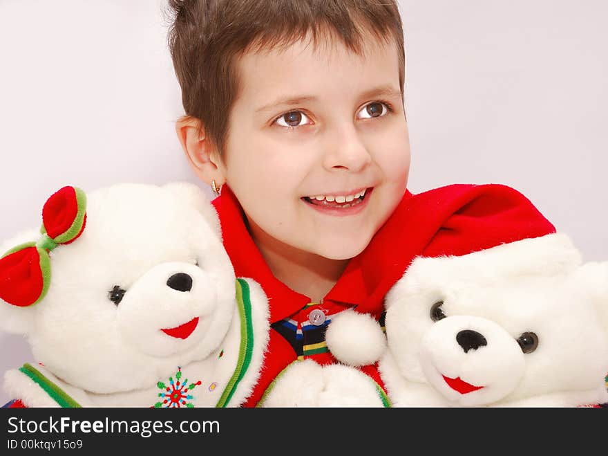 Funny child with christmas bears