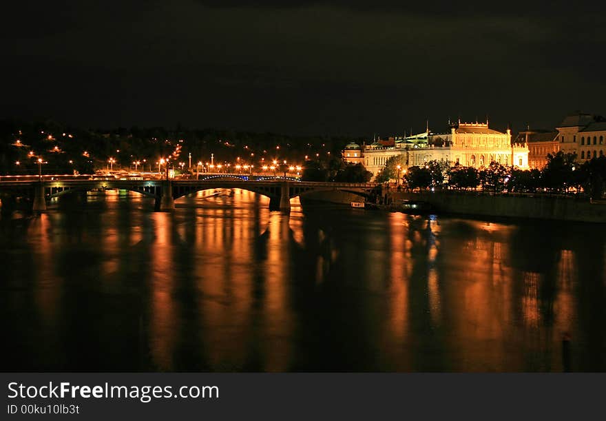 The night view of the beautiful Prague City along the River Vltava