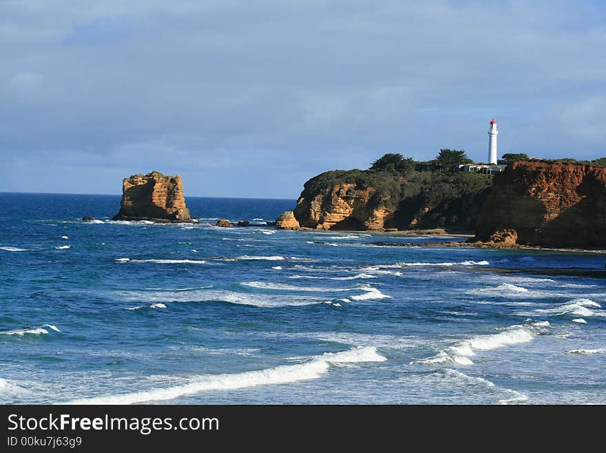 Lighthouse and waves