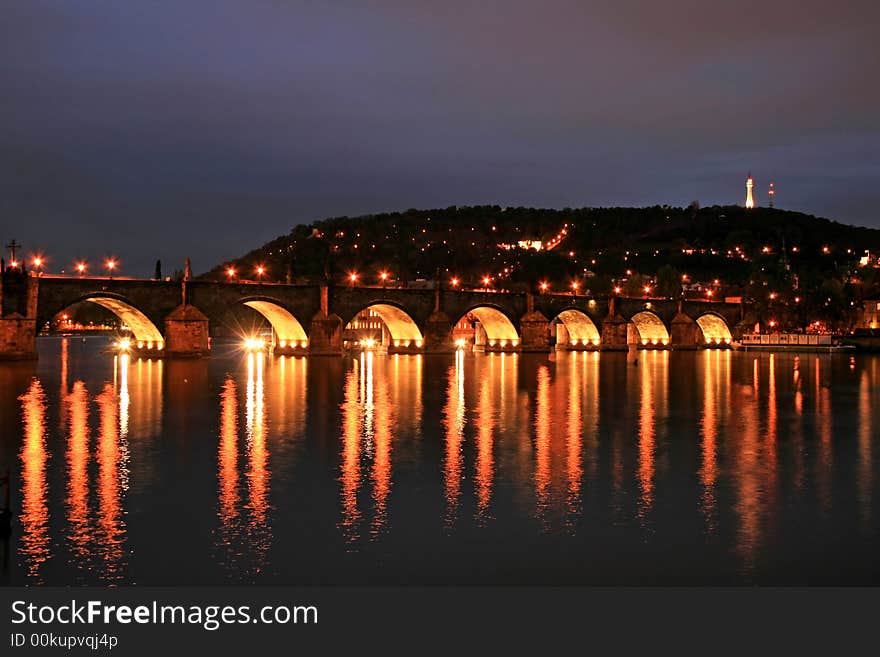 The night view of the Charles Bridge in Prague City