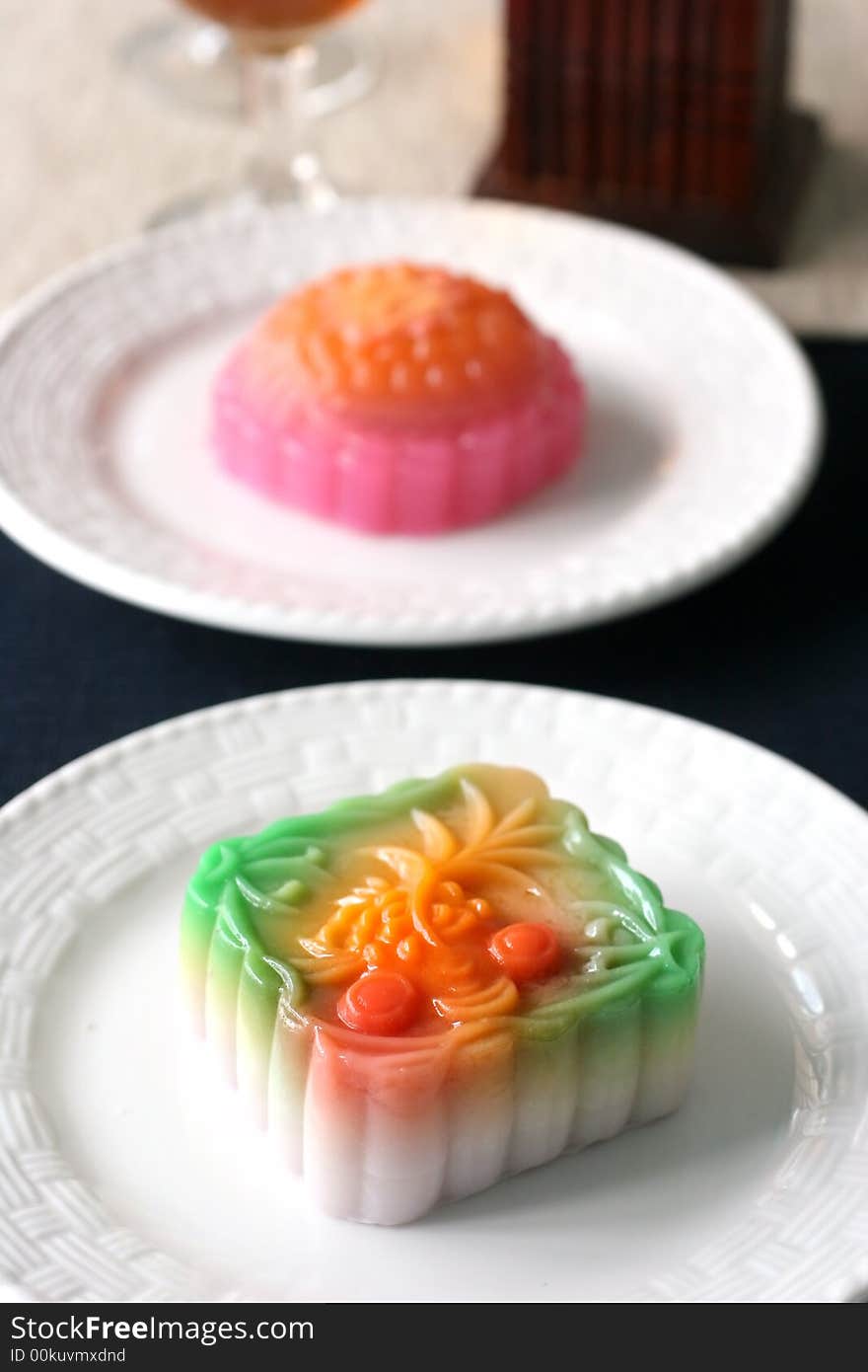 Colorful fruit flavored mooncakes with goldfish patterns signifying prosperity and wealth. Colorful fruit flavored mooncakes with goldfish patterns signifying prosperity and wealth