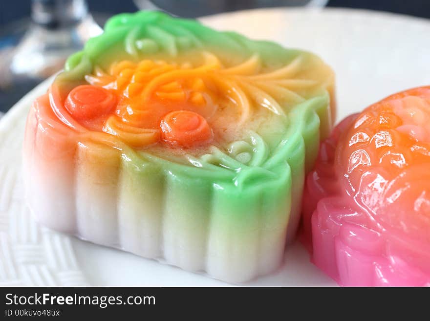 Colorful fruit flavored mooncakes with goldfish patterns signifying prosperity and wealth. Colorful fruit flavored mooncakes with goldfish patterns signifying prosperity and wealth