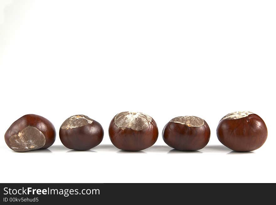 Chestnuts isolated on white background