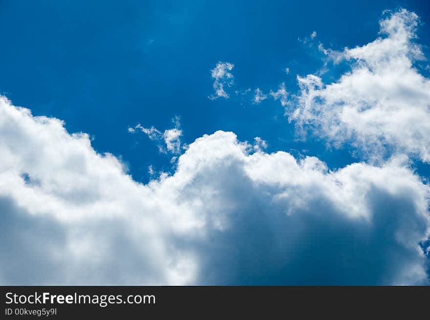 A brilliant blue sky with clouds. A brilliant blue sky with clouds