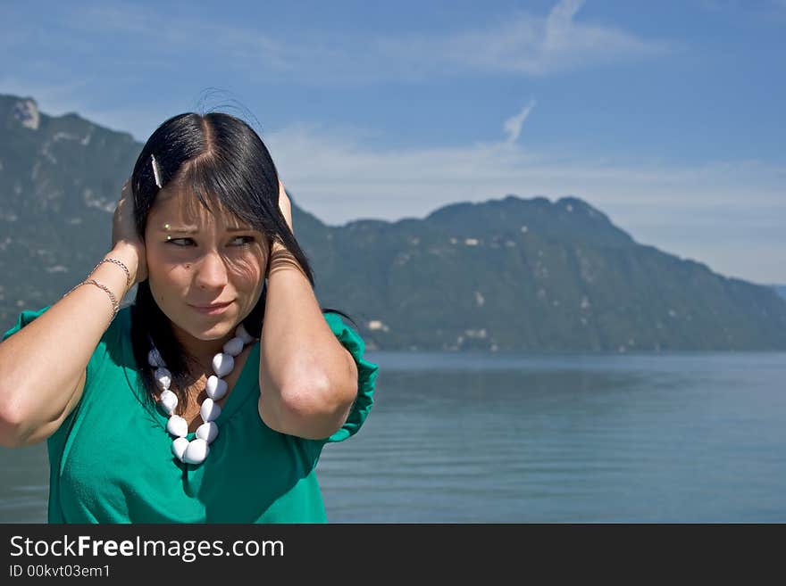 Portrait of a young woman asking for silence