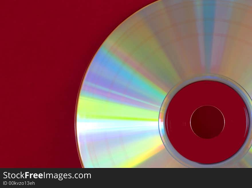 Abstract of compact disc on a red background. Abstract of compact disc on a red background