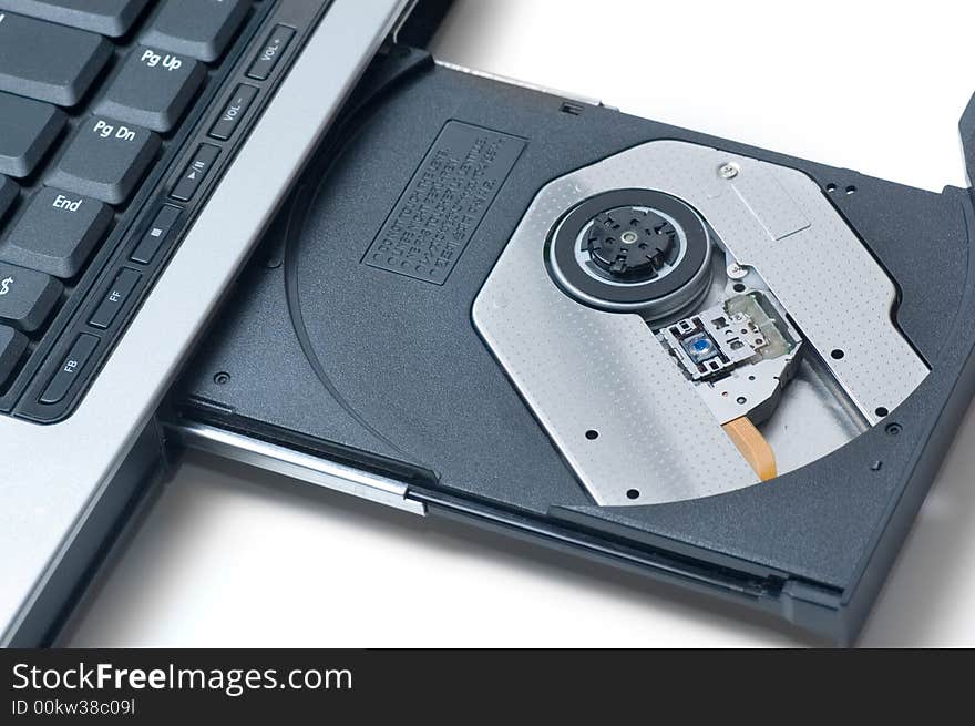 Open CD-ROM drive on a laptop.