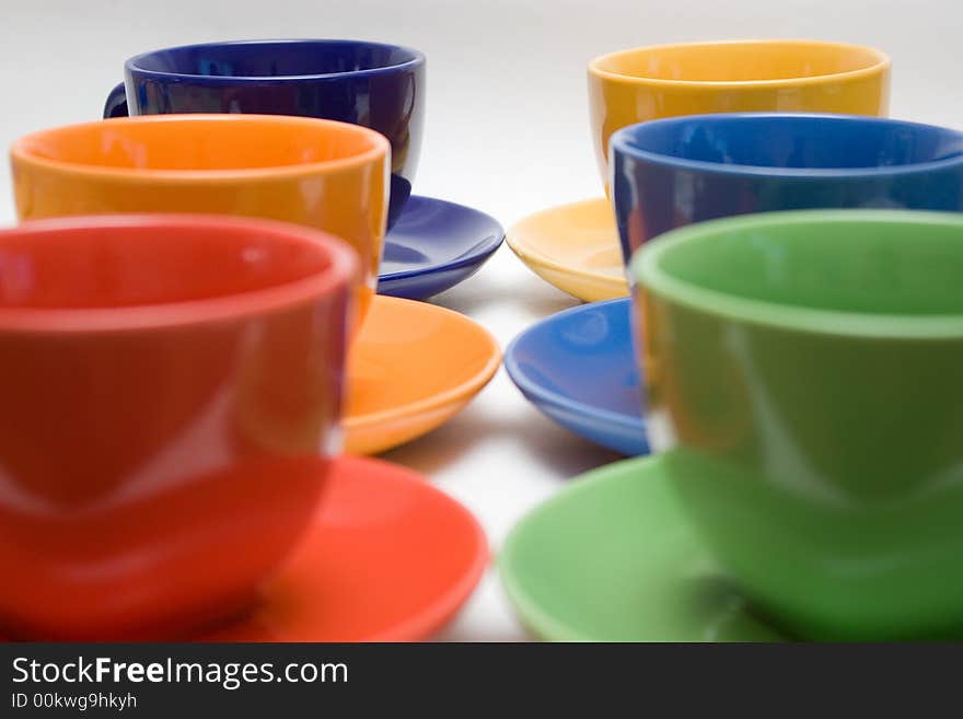 Six color cups on the background. Six color cups on the background