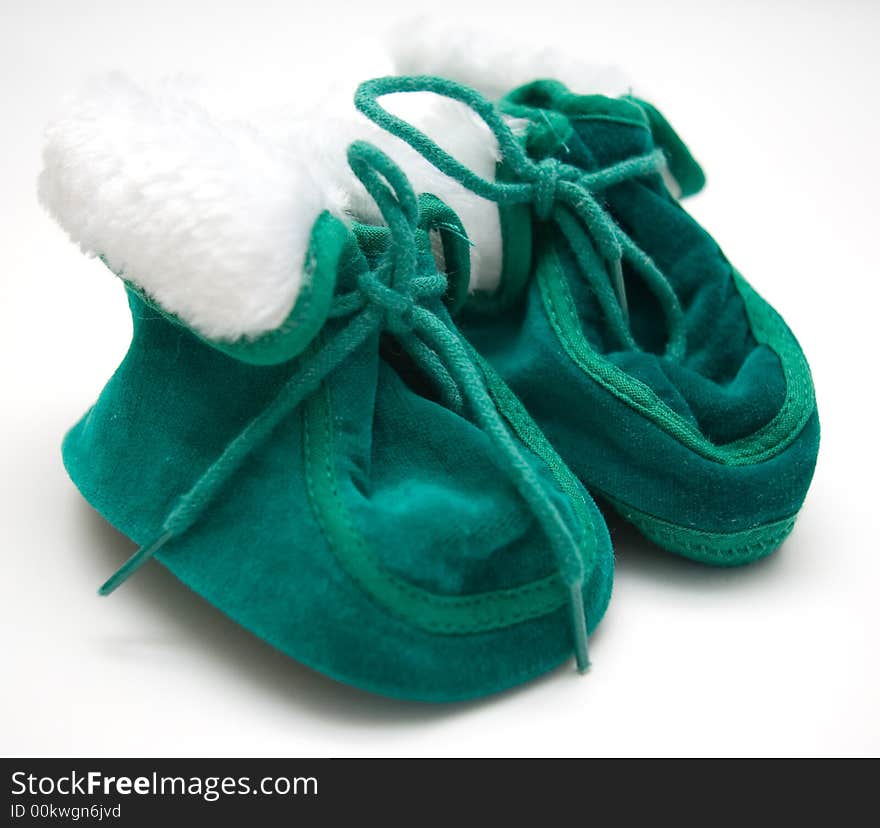 Two little green newborn shoes