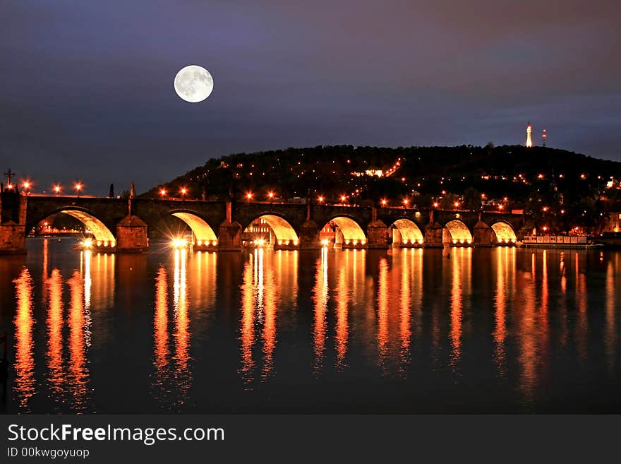 The night view of the beautiful Prague City along the River Vltava. The night view of the beautiful Prague City along the River Vltava