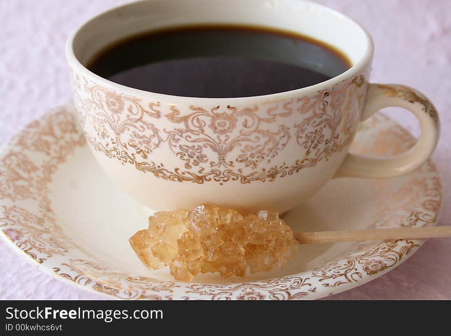 Antique coffee cup on a pink background. Antique coffee cup on a pink background