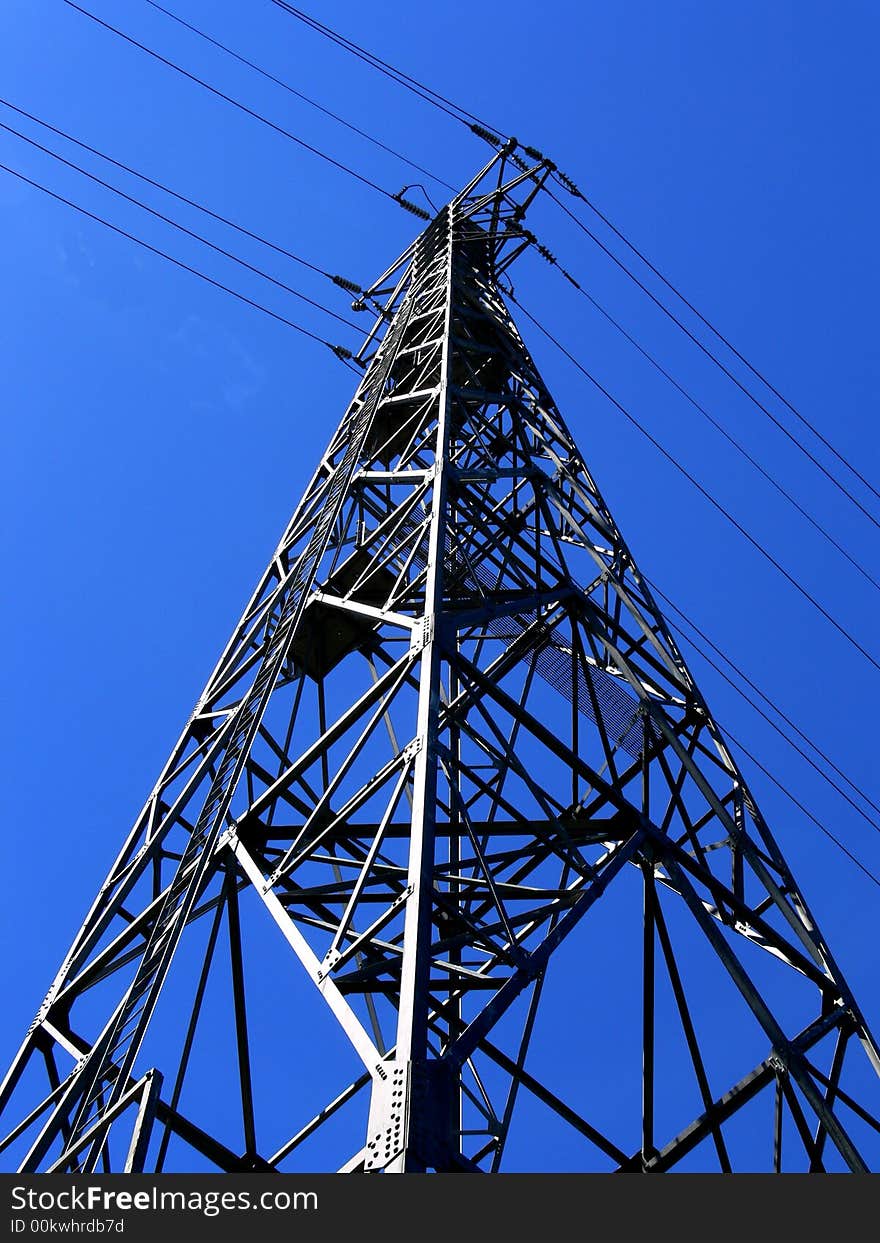 Shot of looking up at a large power tower. Shot of looking up at a large power tower.