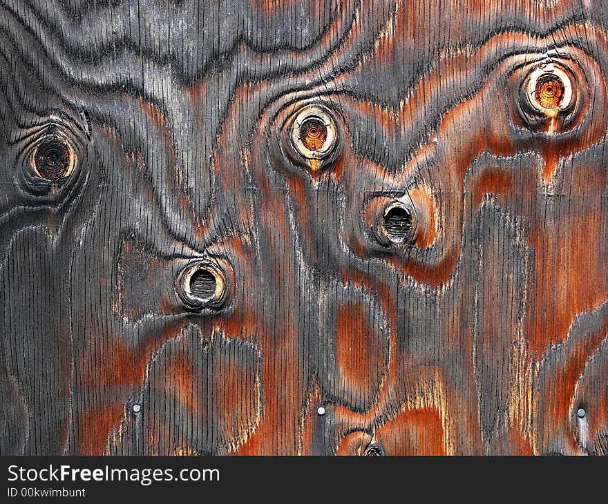 Shot of plywood wall with knots and patterns on it. Shot of plywood wall with knots and patterns on it.