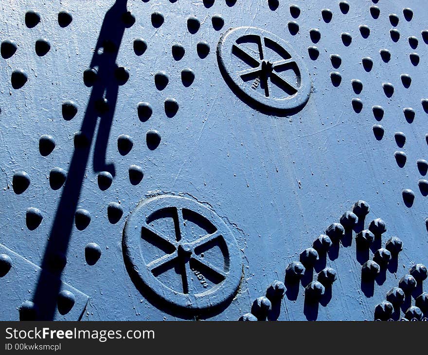 Shot of the side of a bridge structure with rivets and nuts. Shot of the side of a bridge structure with rivets and nuts.