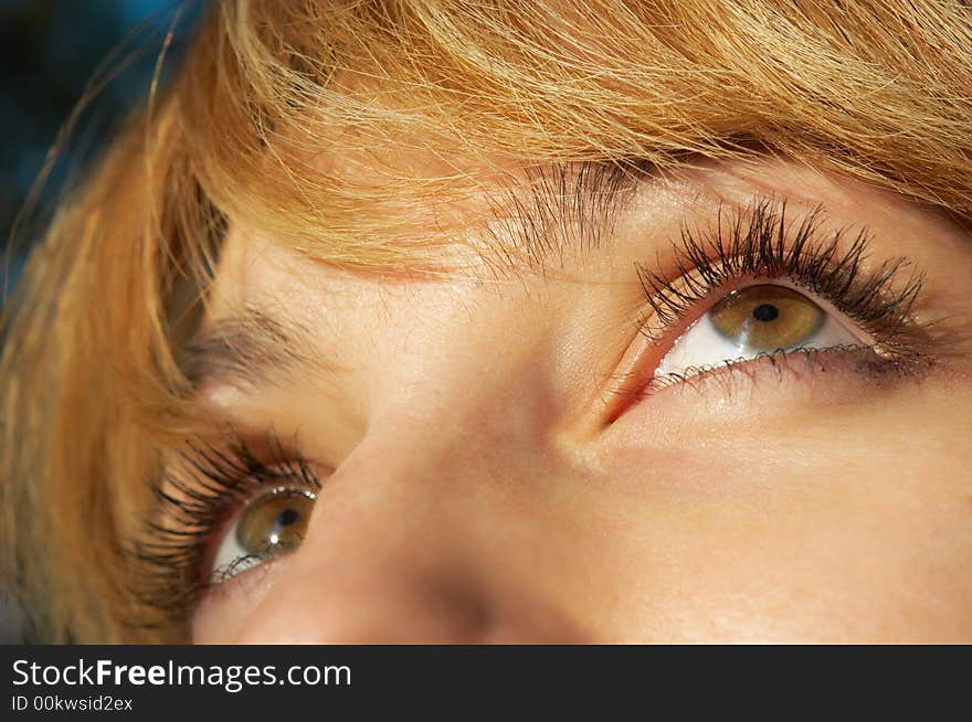 Beautiful blond girl's eyes closeup. selective focus.