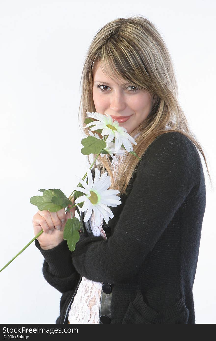 Girl and camomiles