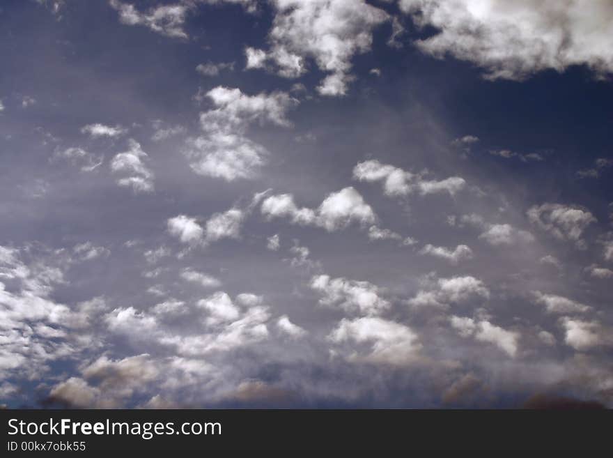 White and dark clouds on sky