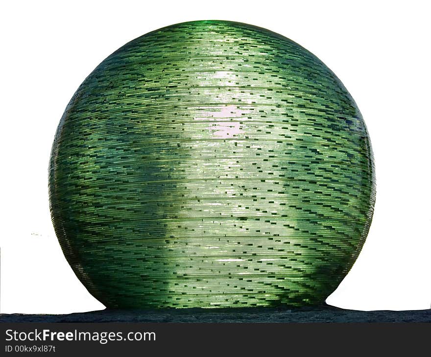 Enormous ball made from the leaves of glass. The sun is translucent through the glass ball. The ball is set on the top of pyramid. Enormous ball made from the leaves of glass. The sun is translucent through the glass ball. The ball is set on the top of pyramid.