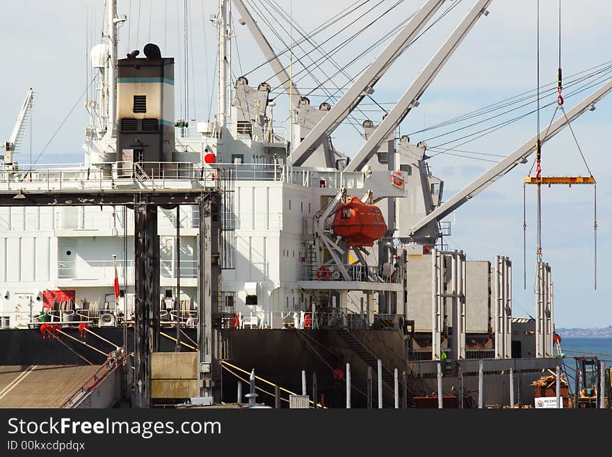 Cargo ship docked at wharf