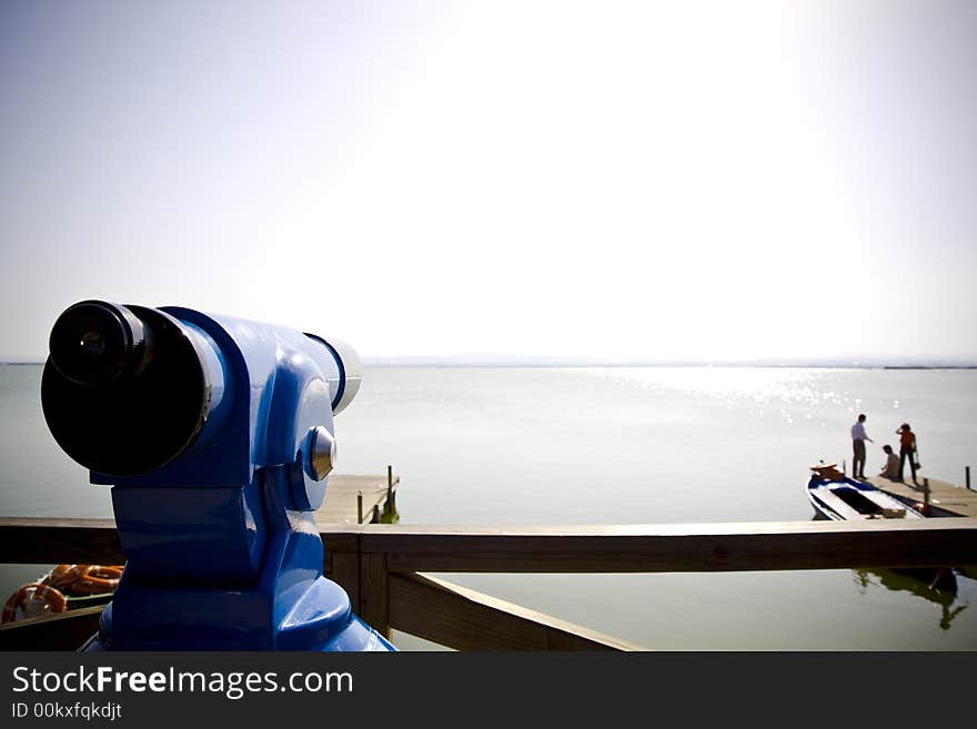 Tourists been observed by a telescope.