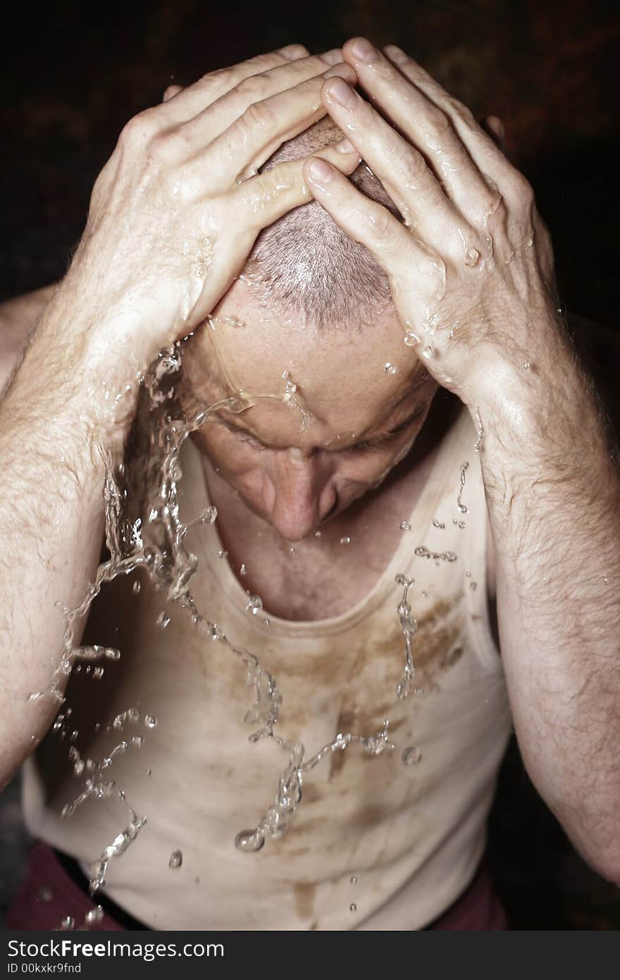 Portrait of a worker having a wash. Portrait of a worker having a wash