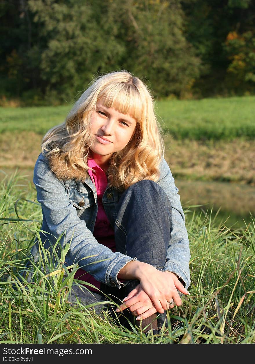 Young Woman On Grass