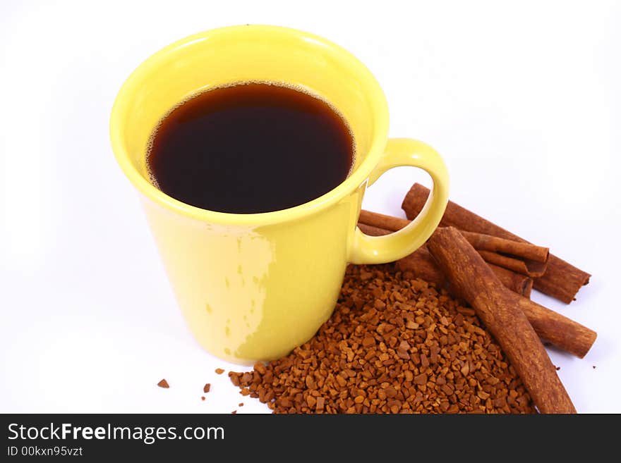 Cup of coffee with coffee grain