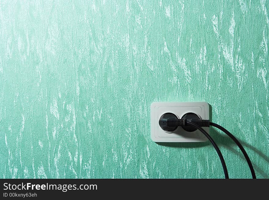 Wall outlets on the green wall