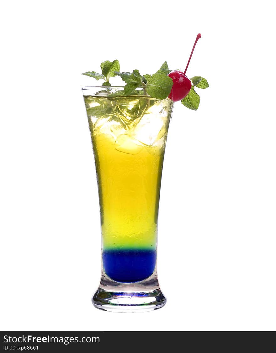 Colorful alcoholic cocktail in a tall glass against white background. Colorful alcoholic cocktail in a tall glass against white background