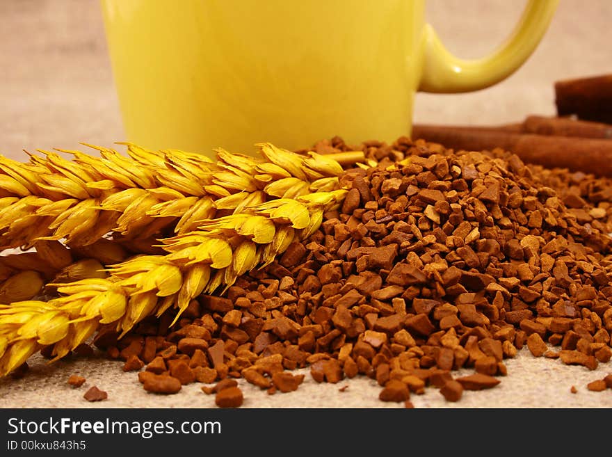 Cup of coffee with coffee grain