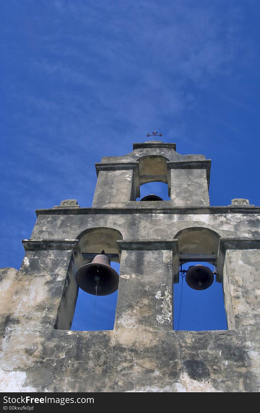 Bell tower on the Mission San Juan Capistrano in San Antonio Texas. Bell tower on the Mission San Juan Capistrano in San Antonio Texas.