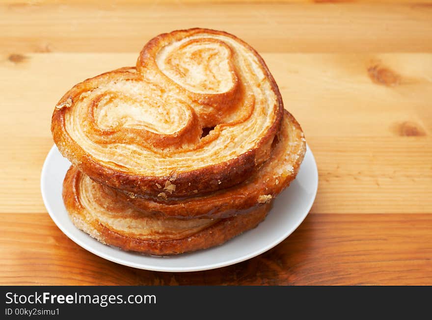 Palmier pastries on saucer