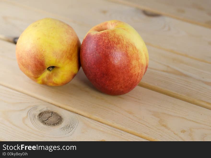 Close up capture two peaches