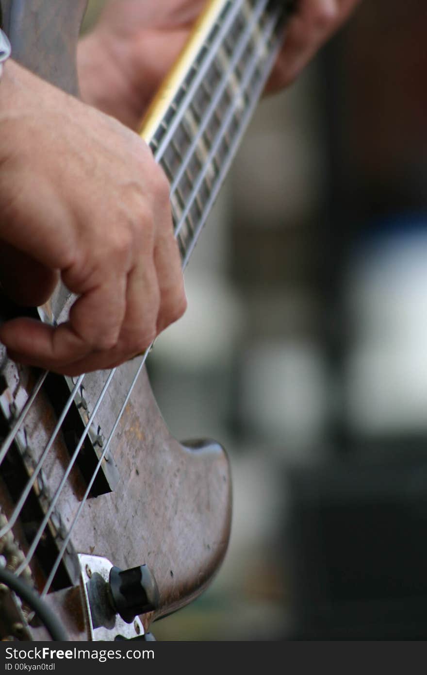 Bass guitarist player at the sat. morning market in st. pete., FL