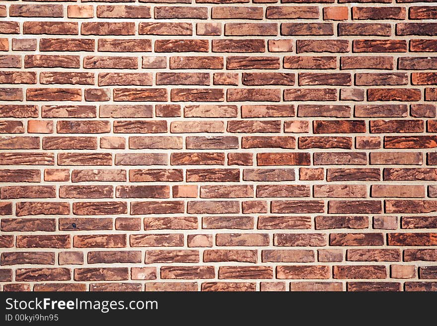 Colorful brick wall, red color, useful for background.