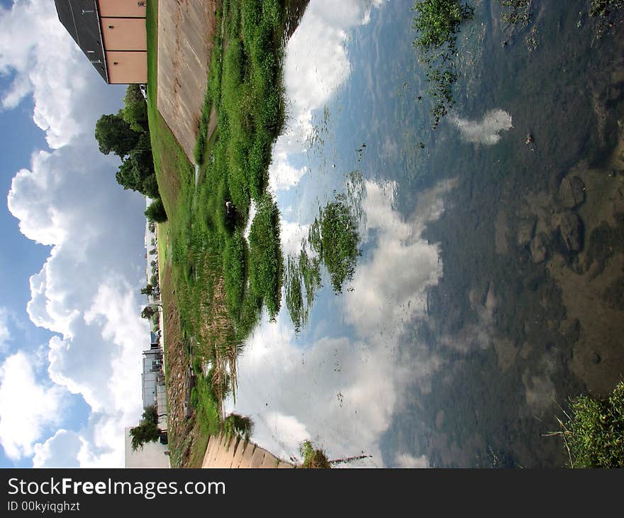 Magnificent clouds reflected in a local creek.  Taken in Austin, Texas. Magnificent clouds reflected in a local creek.  Taken in Austin, Texas.